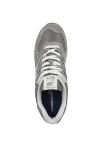 Buty do chodzenia męskie New Balance 574. Zapięcie: sznurówki. Kolor: wielokolorowy, szary, brązowy. Materiał: guma, tkanina, zamsz, materiał, syntetyk. Szerokość cholewki: normalna. Model: New Balance 574. Sport: turystyka piesza