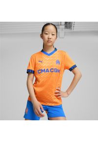 Puma - Młodzieżowa koszulka Olympique Marsylia 24/25 PUMA. Kolor: pomarańczowy, niebieski, wielokolorowy, żółty. Sport: piłka nożna