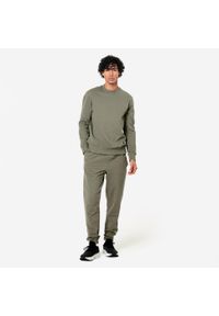 DOMYOS - Bluza męska Domyos Gym & Pilates. Kolor: brązowy, zielony, wielokolorowy. Materiał: tkanina, prążkowany, poliester, materiał, bawełna, elastan. Wzór: ze splotem. Sezon: lato. Sport: joga i pilates