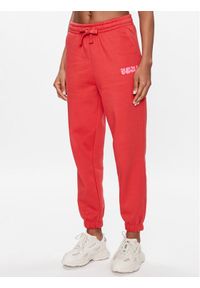 outhorn - Outhorn Spodnie dresowe TTROF178 Czerwony Relaxed Fit. Kolor: czerwony. Materiał: bawełna, dresówka