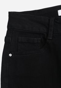 Born2be - Czarne Jeansy o Kroju Dzwonów z Bawełną Eshirevera. Okazja: na co dzień. Kolor: czarny. Długość: długie. Styl: casual #5