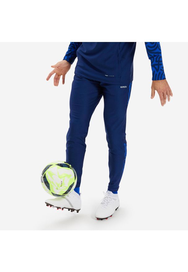 KIPSTA - Spodnie do piłki nożnej Kipsta Viralto. Kolor: niebieski. Materiał: elastan, poliester, materiał. Sport: piłka nożna