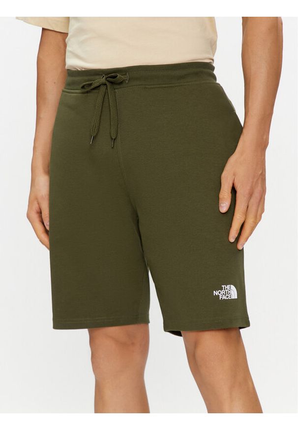 The North Face Szorty sportowe Graphic NF0A3S4F Zielony Regular Fit. Kolor: zielony. Materiał: bawełna. Styl: sportowy