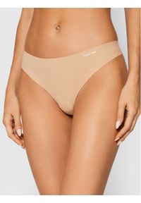 Calvin Klein Underwear Stringi 0000D3428E Beżowy. Kolor: beżowy. Materiał: syntetyk