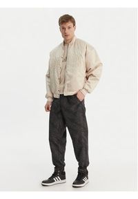 Adidas - adidas Spodnie dresowe PrimeLift Workout KA1202 Szary Loose Fit. Kolor: szary. Materiał: syntetyk #4