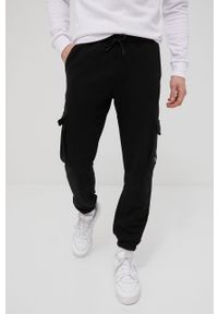 Jack & Jones spodnie męskie kolor czarny gładkie. Kolor: czarny. Materiał: dzianina. Wzór: gładki