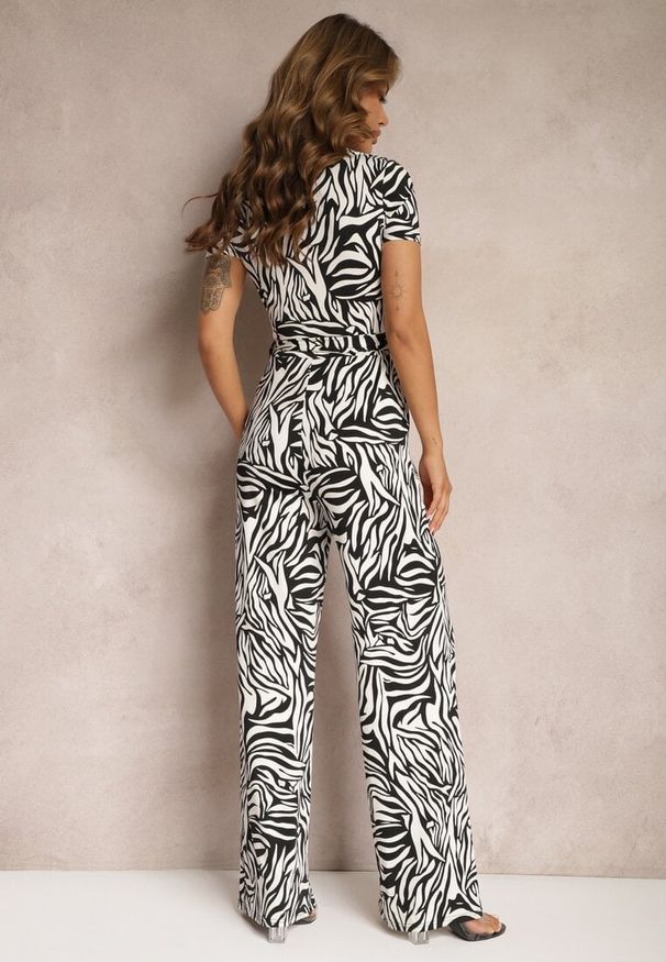 Renee - Czarno-Biały Kopertowy Kombinezon Taliowany z Szerokimi Nogawkami Talamla. Okazja: na co dzień. Kolor: czarny. Styl: elegancki, casual