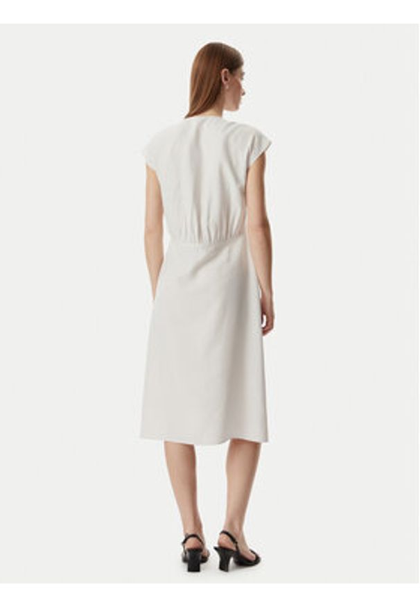 Calvin Klein Sukienka codzienna LV044F016G Beżowy jasny Regular Fit. Okazja: na co dzień. Kolor: beżowy. Materiał: lyocell. Typ sukienki: proste. Styl: casual