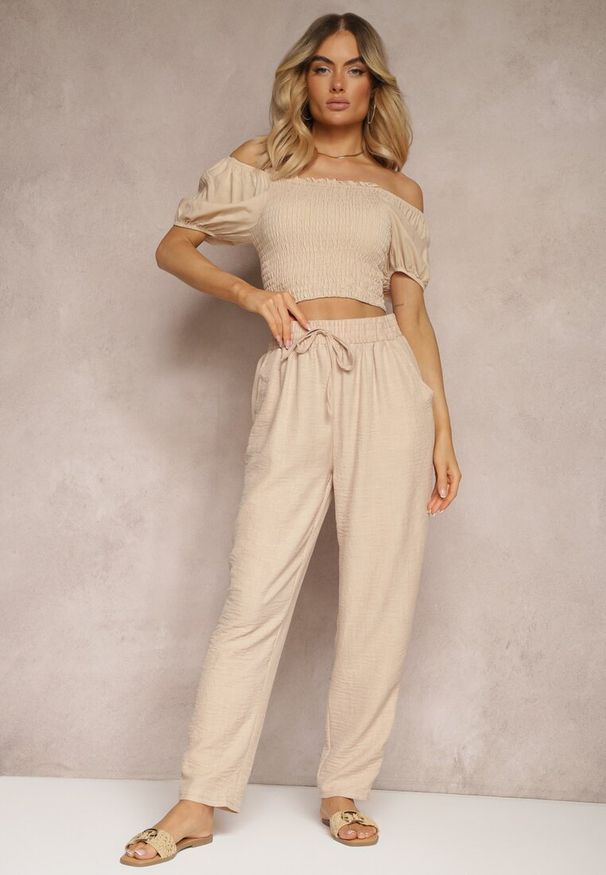 Renee - Beżowe Spodnie z Troczkiem w Pasie i Kieszeniami Ufalia. Okazja: na co dzień. Kolor: beżowy. Materiał: materiał. Styl: elegancki, casual