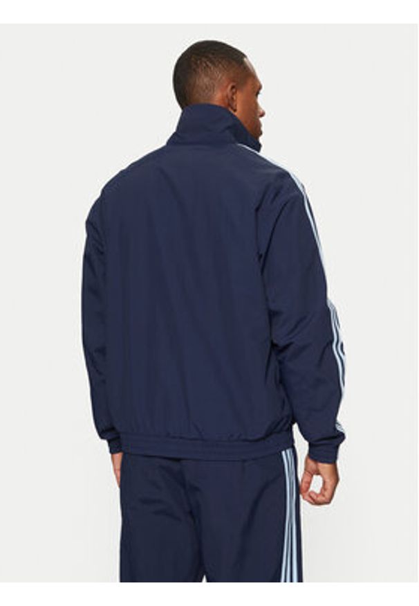 Adidas - adidas Bluza adicolor Firebird JP1253 Granatowy Loose Fit. Kolor: niebieski. Materiał: syntetyk
