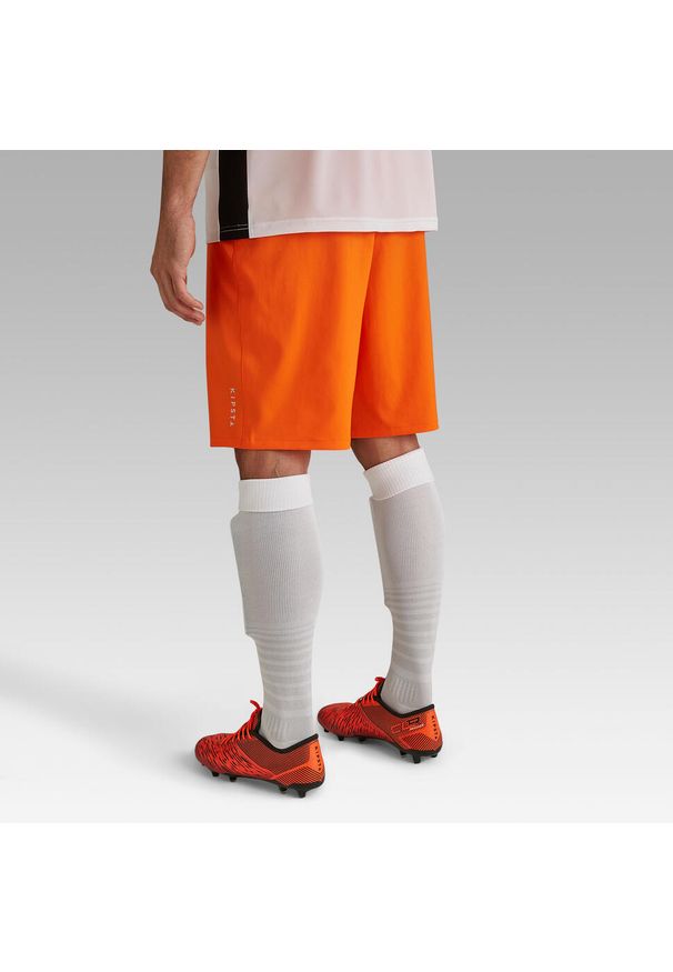 KIPSTA - Spodenki piłkarskie Kipsta Viralto Club. Kolor: pomarańczowy. Materiał: poliester, poliamid, materiał, elastan. Sport: bieganie, piłka nożna