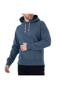 Bluza Champion Hooded Sweatshirt 218800-BM513 - granatowa. Typ kołnierza: kaptur. Kolor: niebieski. Materiał: bawełna, tkanina, poliester. Wzór: aplikacja. Styl: sportowy, klasyczny