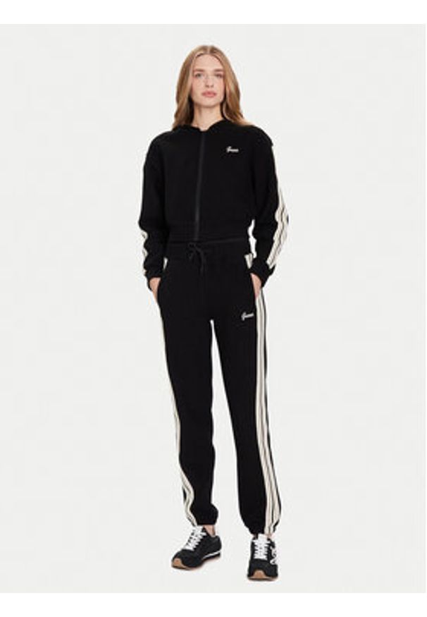 Guess Spodnie dresowe V5BB17 KCX52 Czarny Regular Fit. Kolor: czarny. Materiał: syntetyk