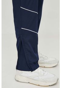 Lacoste dres męski kolor granatowy. Kolor: niebieski. Materiał: dresówka #4