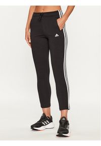 Adidas - adidas Spodnie dresowe Essentials 3-Stripes IC6126 Czarny Slim Fit. Kolor: czarny. Materiał: bawełna #1