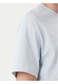 Calvin Klein T-Shirt Emblem Graphic LV14RF817G Błękitny Regular Fit. Kolor: niebieski. Materiał: bawełna #3