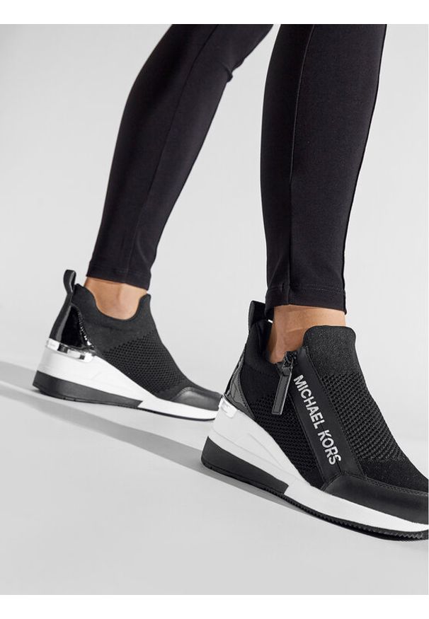 MICHAEL Michael Kors Sneakersy Willis Wedge Trainer 43S2WIFS1D Czarny. Kolor: czarny. Materiał: materiał