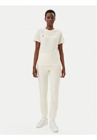 Champion Spodnie dresowe 118101 Écru Slim Fit. Materiał: bawełna