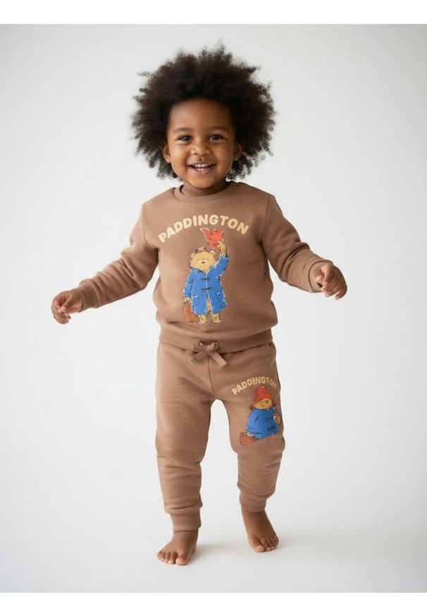 Sinsay - Spodnie jogger Paddington - brązowy. Kolor: brązowy