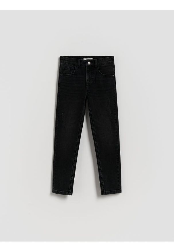 Reserved - Jeansy slim z dziurami - czarny. Kolor: czarny