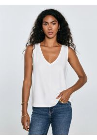 Big-Star - Koszulka damska na ramiączkach z wiskozy biała Pistima 100. Okazja: na co dzień. Typ kołnierza: dekolt w serek. Kolor: biały. Materiał: wiskoza. Długość rękawa: na ramiączkach. Wzór: aplikacja. Sezon: lato. Styl: casual, klasyczny, elegancki #1