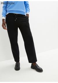 bonprix - Spodnie dresowe Essential, szerokie nogawki. Kolor: czarny. Materiał: dresówka