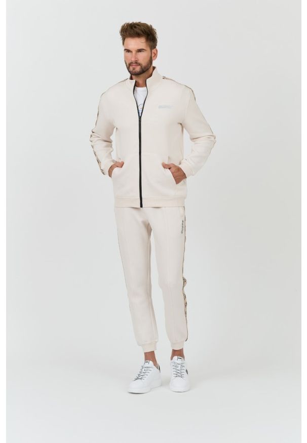 Guess - GUESS Beżowe męskie spodnie Mickey Cuff Pant, Rozmiar S. Kolor: beżowy