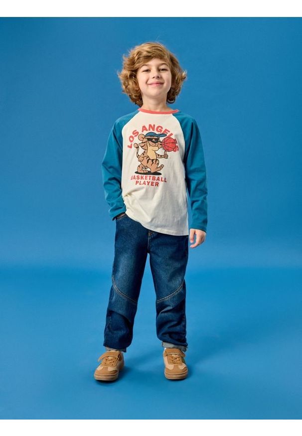 Sinsay - Jeansy chino z efektem sprania - granatowy. Kolor: niebieski