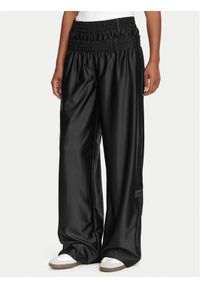 Adidas - adidas Spodnie dresowe Adibreak KS9145 Czarny Loose Fit. Kolor: czarny. Materiał: syntetyk #1