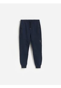 Reserved - Sportowe joggery - granatowy. Kolor: niebieski. Materiał: dresówka, bawełna, dzianina. Styl: sportowy #1