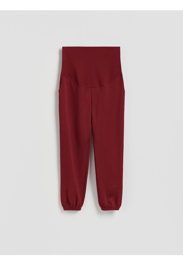 Reserved - Bawełniane spodnie jogger - bordowy. Kolor: czerwony. Materiał: bawełna