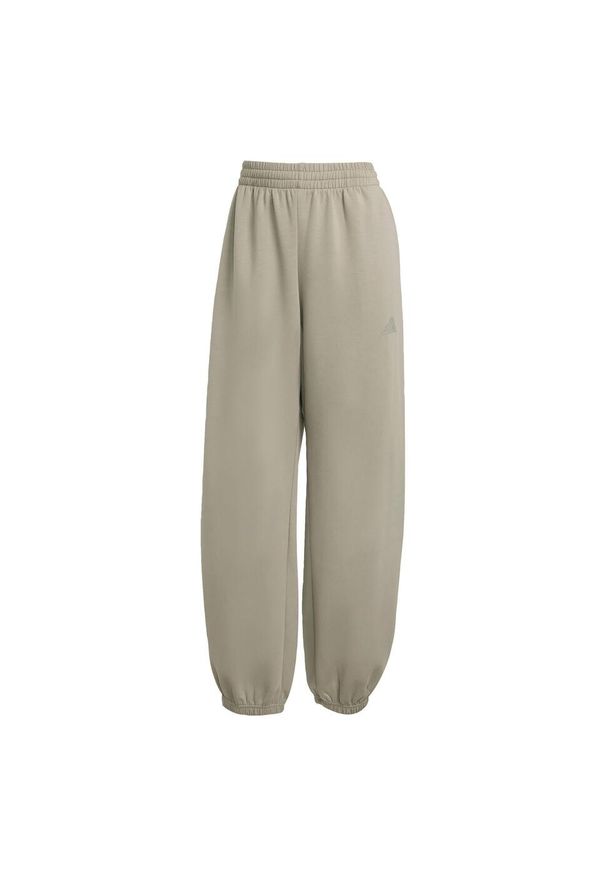 Adidas - Spodnie ALL SZN Soft Lux Loose. Kolor: szary
