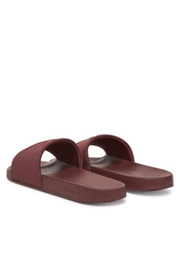 Calvin Klein Jeans Klapki Slide Hf Mono Cv YM0YM01282 Brązowy. Kolor: brązowy. Materiał: materiał