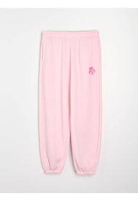 Sinsay - Spodnie jogger z kwiatowym nadrukiem - różowy. Kolor: różowy. Wzór: nadruk, kwiaty #1
