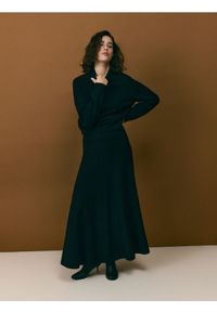 Reserved - Golf z wełną - czarny. Typ kołnierza: golf. Kolor: czarny. Materiał: wełna #1