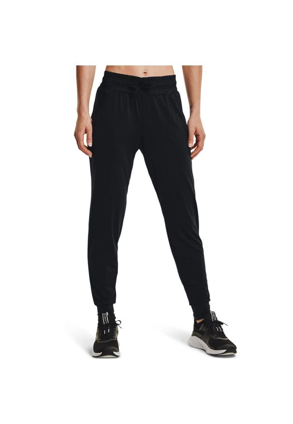 Spodnie damskie Under Armour HeatGear. Kolor: wielokolorowy, szary, czarny. Materiał: poliester, materiał. Sport: fitness