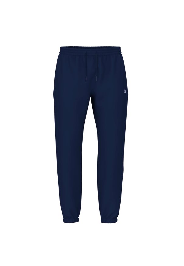 Spodnie męskie New Balance MP41519NNY – granatowe. Kolor: niebieski. Materiał: bawełna, dresówka, poliester. Wzór: haft