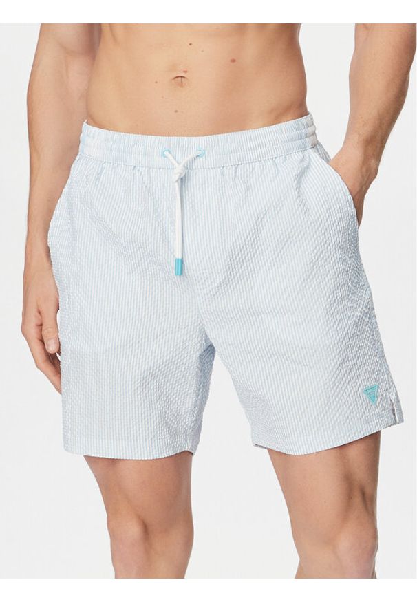 Guess Szorty kąpielowe F6GT11 WN342 Niebieski jasny Regular Fit. Kolor: niebieski. Materiał: syntetyk