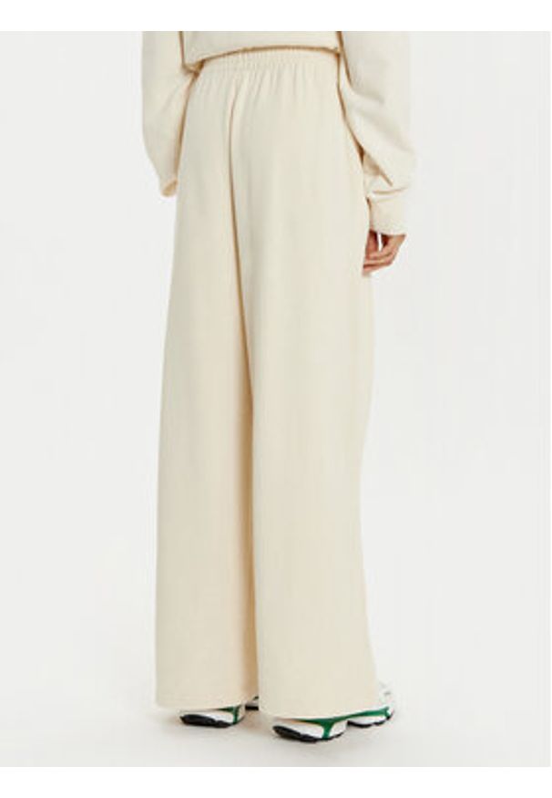 Lacoste Spodnie dresowe XF2657 Écru Wide Leg. Materiał: bawełna