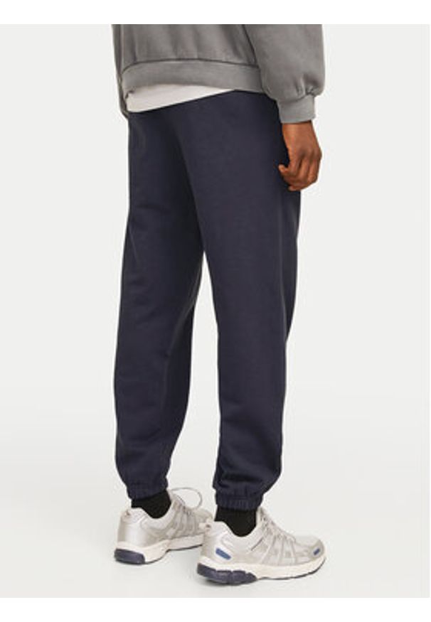 Jack & Jones - Jack&Jones Spodnie dresowe Morgan 12257964 Granatowy Regular Fit. Kolor: niebieski. Materiał: bawełna