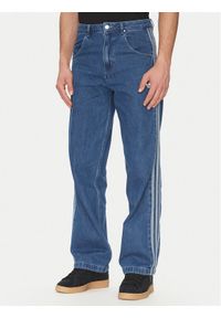 Adidas - adidas Jeansy adicolor Denim Firebird JC6234 Niebieski Straight Fit. Kolor: niebieski