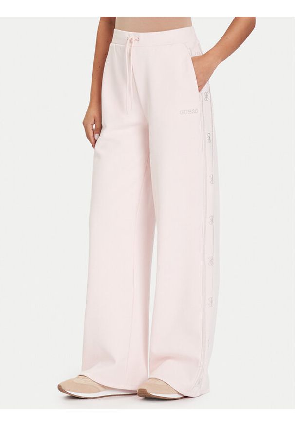 Guess Spodnie dresowe V5BB12 KCX22 Różowy Wide Leg. Kolor: różowy. Materiał: syntetyk