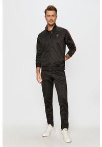 Trussardi Jeans - Spodnie. Kolor: czarny. Materiał: bawełna, dzianina, elastan. Wzór: aplikacja #5