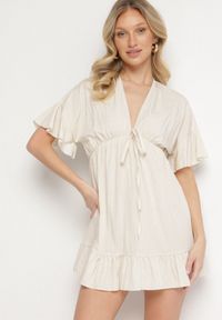 Born2be - Beżowa Nietoperzowa Sukienka z Wiskozą o Rozkloszowanym Kroju z Falbanką Tullimi. Okazja: na co dzień. Typ kołnierza: dekolt w kształcie V. Kolor: beżowy. Materiał: wiskoza. Styl: casual, elegancki #1