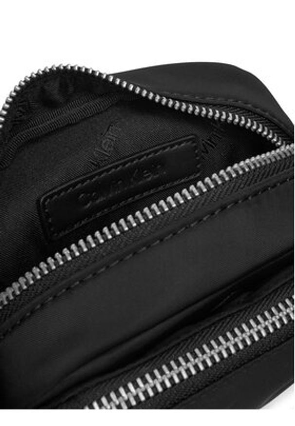Calvin Klein Saszetka Business Tech Reporter Xs K50K512888 Czarny. Kolor: czarny. Materiał: materiał