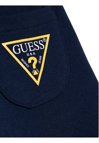 Guess Spodnie dresowe N93Q17 KAUG0 Granatowy Regular Fit. Kolor: niebieski. Materiał: bawełna #3