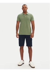 Tommy Jeans Polo DM0DM20676 Zielony Slim Fit. Typ kołnierza: polo. Kolor: zielony. Materiał: bawełna