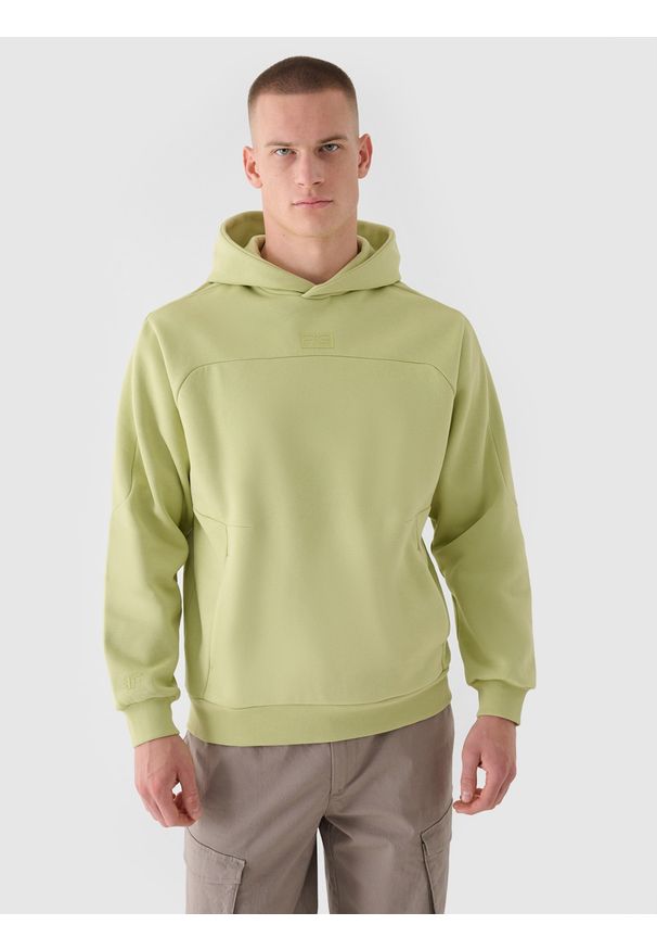 4f - 4F Bluza dresowa nierozpinana z kapturem męska 4F x Robert Lewandowski - zielona L. Okazja: na co dzień. Typ kołnierza: kaptur. Kolor: zielony. Materiał: dresówka. Długość rękawa: raglanowy rękaw. Wzór: aplikacja, gładki, ze splotem. Styl: sportowy, casual