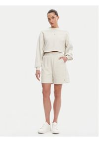 Calvin Klein Jeans Szorty sportowe J20J225221 Beżowy Relaxed Fit. Kolor: beżowy. Materiał: bawełna #2