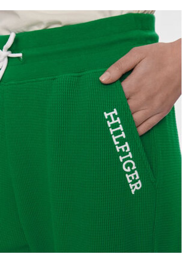 TOMMY HILFIGER - Tommy Hilfiger Spodnie dresowe UW0UW04946 Zielony Relaxed Fit. Kolor: zielony. Materiał: bawełna